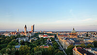 panoramic skyline of Leipzig with townhall and high court at sunset, Germany